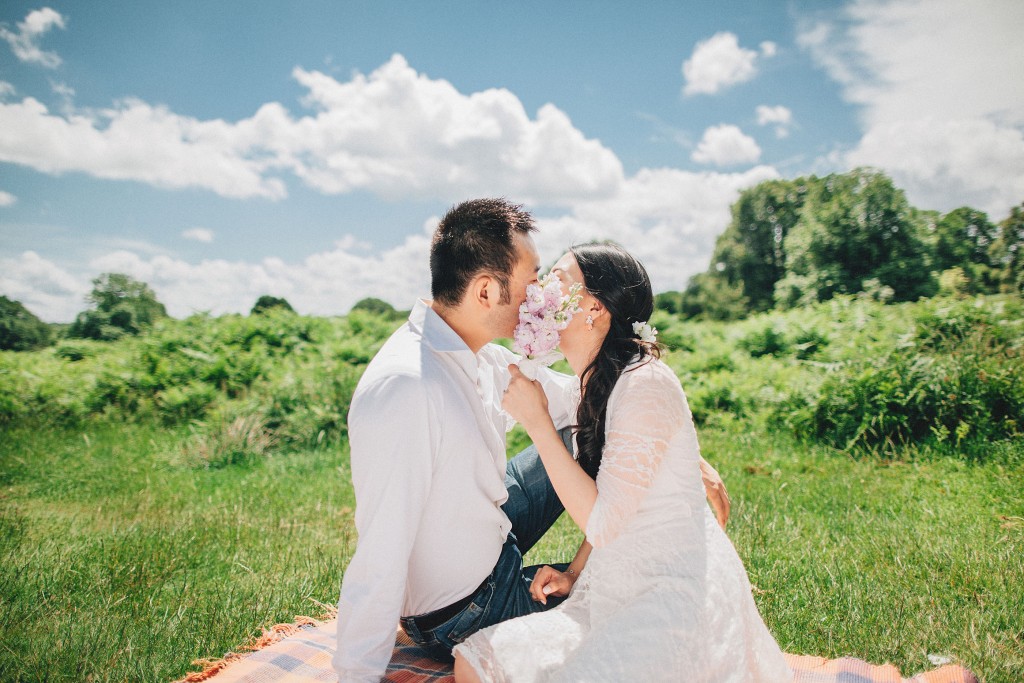 nicholas-lau-nicholau-weddings-london-film-photography-beautiful-pretty-blog-first-wedding-love-cute-white-dress-chinese-asian-engagement-ring-diamond-pink-bouquet-kissing-picnic-blanket-richmond-blue-sky