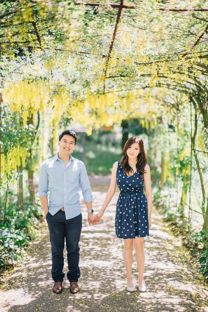 nicholas-lau-nicholau-beautiful-film-photography-love-london-engagement-couple-sunlight-summer-chinese-asian-petersham-nurseries-richmond-park-arbor-vineyard-vines-canopy-holding-hands