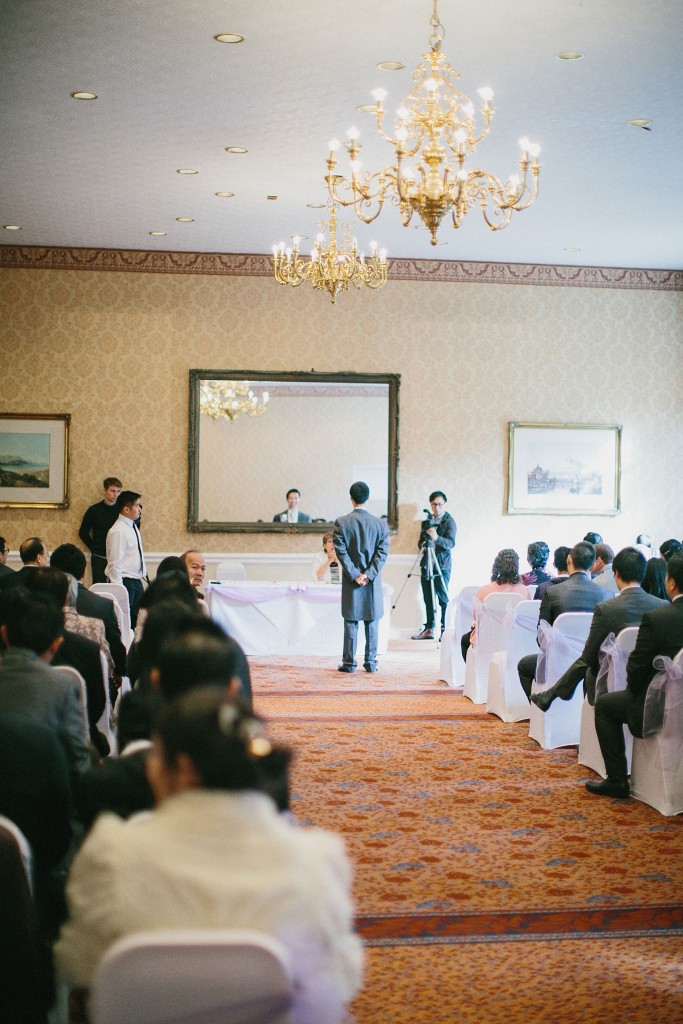 nicholas-lau-nicholau-london-film-photography-chinese-asian-wedding-groom-waiting-for-his-bride-at-alter-end-of-aisle