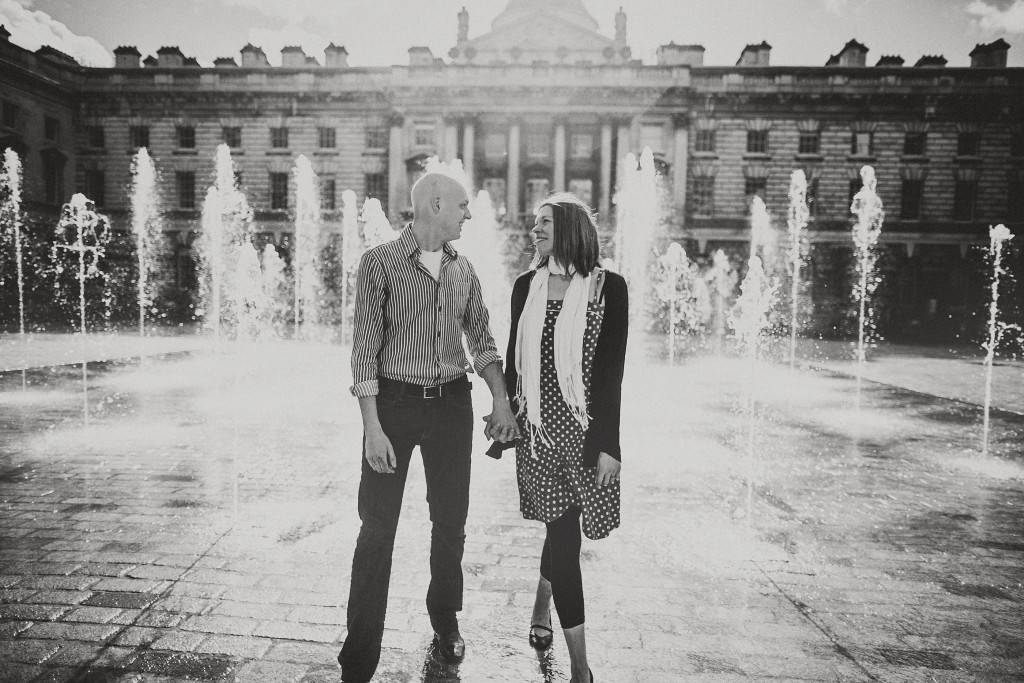nicholas-lau-nicholau-lincolns-inns-fields-somerset-house-engagement-couple-photo-love-london-black-and-white-photography-holding-gazing-looking-into-each-others-eyes-conversation-good