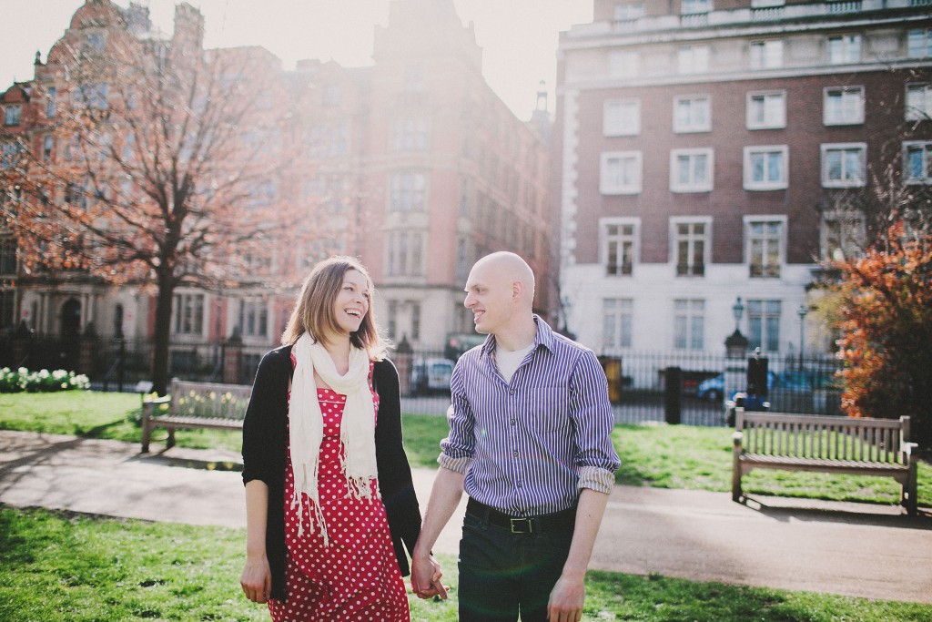 nicholas-lau-nicholau-lincolns-inns-fields-somerset-house-engagement-couple-photos-prewedding-love-london-photography-walking-holding-hands-in-love-conversation-smiling-sun