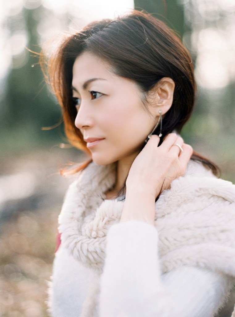 nicholas-lau-nicholau-portrait-photography-winter-fall-fine-art-contax-645-fuji-film-japanese-lady-girl-tucking-hair-earrings-smile