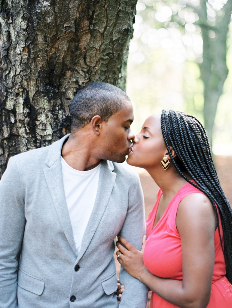 nicholau-nicholas-lau-photography-couples-session-pre-wedding-engagement-love-african-london-coral-dress-grey-blazer-braids-peck-kisses