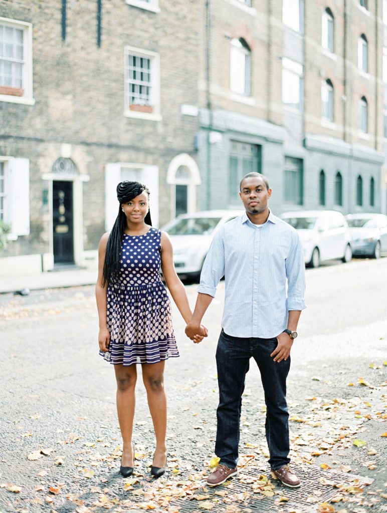 nicholau-nicholas-lau-photography-couples-session-pre-wedding-engagement-love-african-london-leaves-fall-street-holding-hands-stand-proud-together-jeans-purple-dress-braids