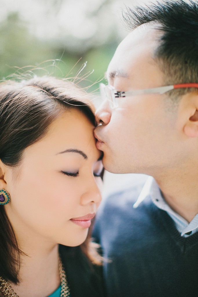 nicholas-lau-nicholau-engagement-spring-photography-peony-and-mockingbird-chinese-couple-battersea-park-westminster-something-blue-kiss-peck-stand-tall-together-c