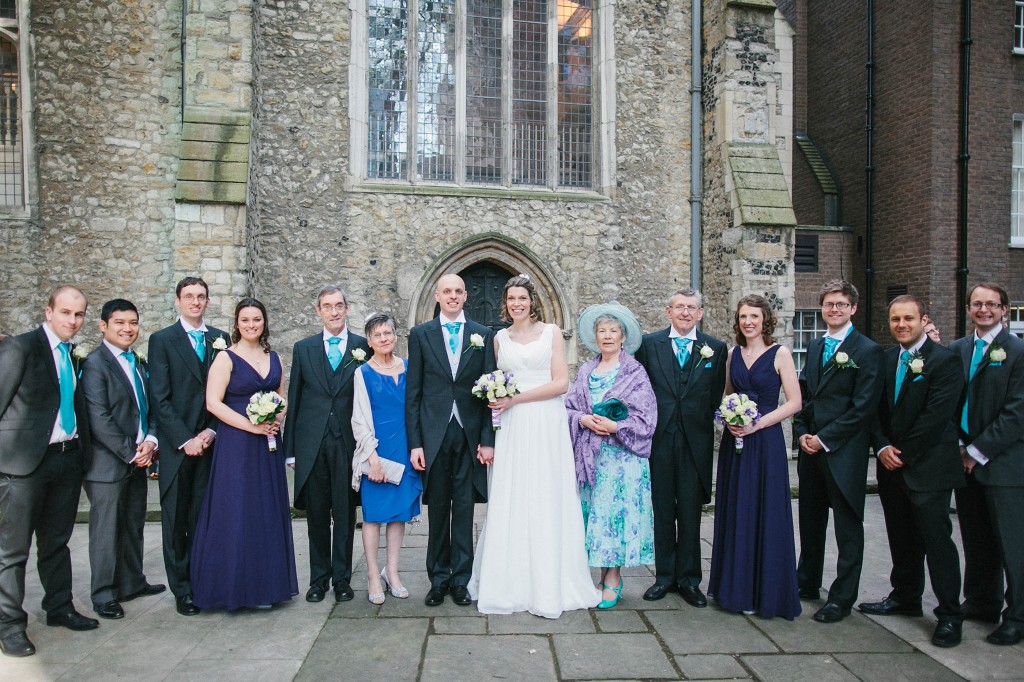 nicholas-lau-nicholau-london-weddings-fine-art-photography-leadenhall-market-st-helens-church-documentary-style-whole-family-view-together-groom-bride-party