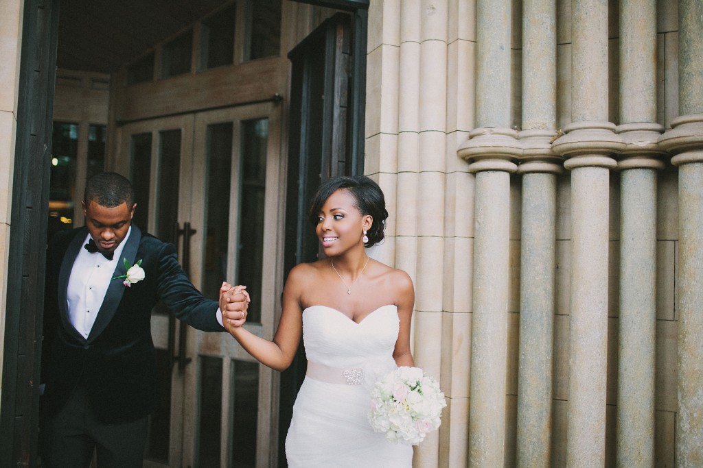 Nicholau-nicholas-lau-photography-london-uk-wedding-fine-art-film-nigerian-black-african-traditional-leading-out-from-the-chruch-bride-bouquet-hold-my-hand