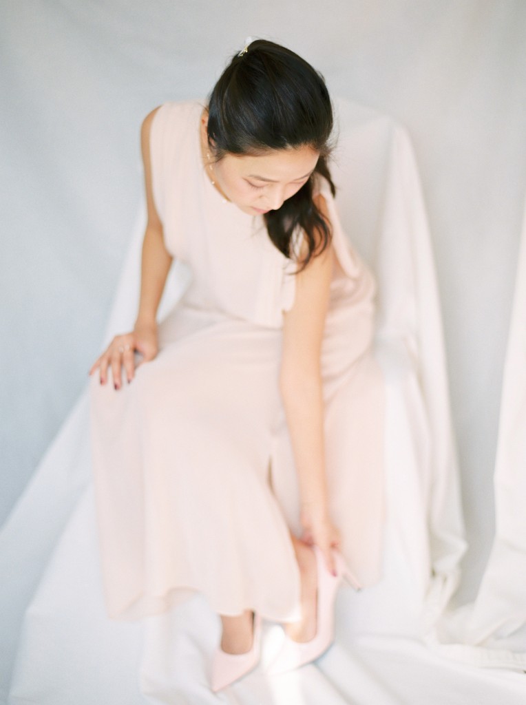 Nicholas-lau-nicholau-film-fine-art-photography-portraits-korean-asian-tea-pot-fuji-400-contax-645-pretty-beautiful-heels-shoes-sitting-peach-dress