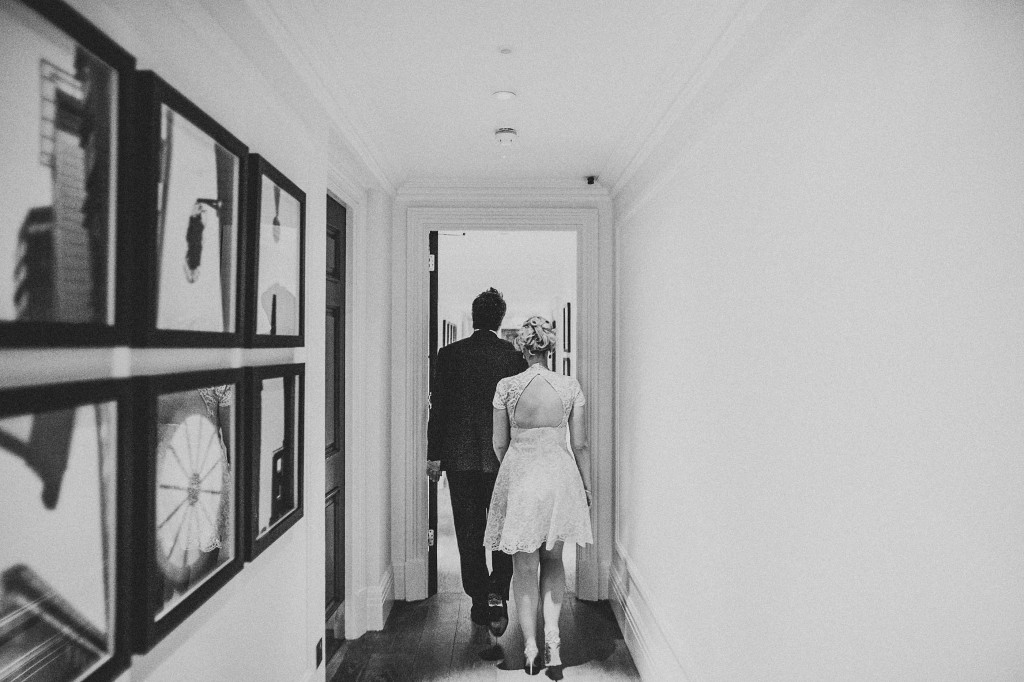 nicholas-lau-nicholau-wedding-photography-photographer-fine-art-film-winter-christmas-london-UK-modern-unique-the-arch-asia-house-bide-groom-walking-down-hallway