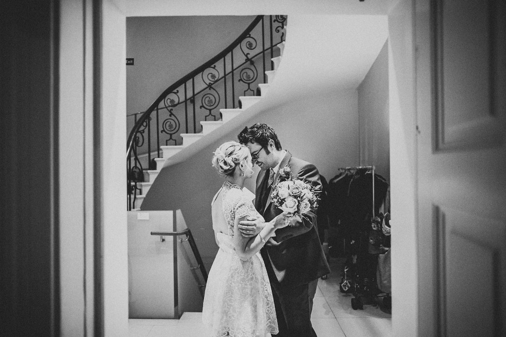 nicholas-lau-nicholau-wedding-photography-photographer-fine-art-film-winter-christmas-london-UK-modern-unique-the-arch-asia-house-black-white-kiss-groom-bride