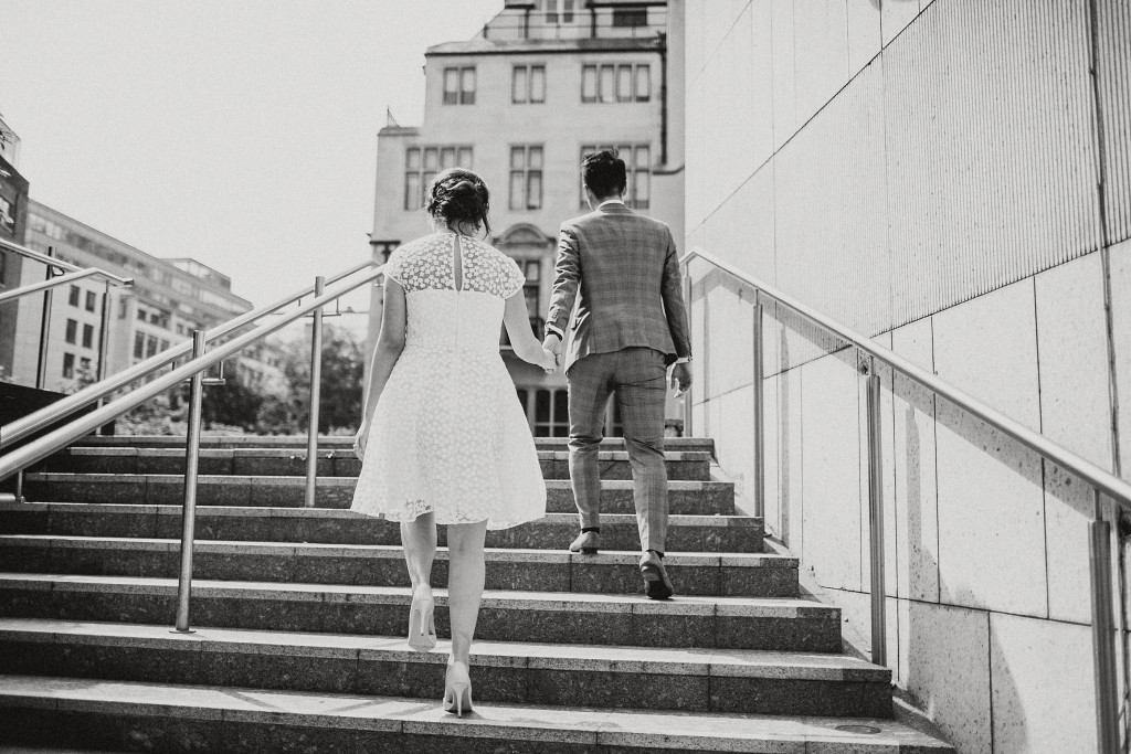 nicholas-lau-nicholau-photo-photography-fine-art-hybrid-engagement-chinese-asian-couple-london-uk-white-dress-grey-suit-black-white-walking-up-together