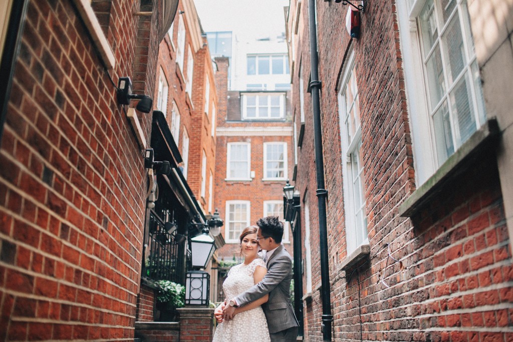 nicholas-lau-nicholau-photo-photography-fine-art-hybrid-engagement-chinese-asian-couple-london-uk-white-dress-grey-suit-brick-walls-buildings-old-windows