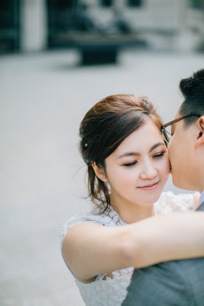 nicholas-lau-nicholau-photo-photography-fine-art-hybrid-engagement-chinese-asian-couple-london-uk-white-dress-grey-suit-kiss-on-the-cheek
