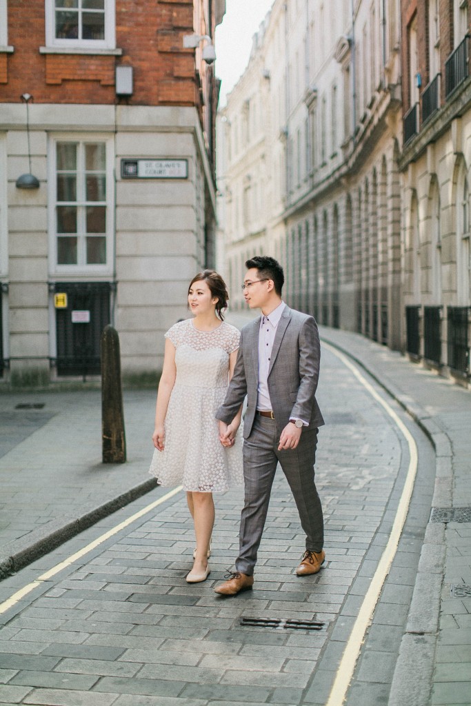 nicholas-lau-nicholau-photo-photography-fine-art-hybrid-engagement-chinese-asian-couple-london-uk-white-dress-grey-suit-looking-around-talking-walking