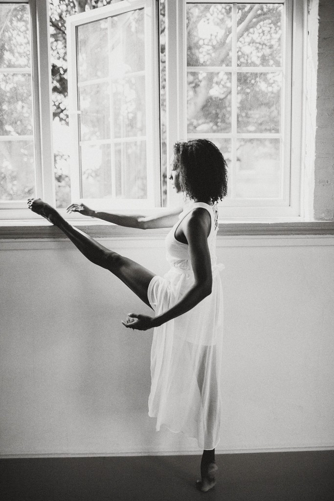 nicholas-lau-photo-photography-uk-london-black-african-american-ballerina-ballet-flats-dancer-dancing-light-sun-sudio-barefoot-stretching-by-the-window