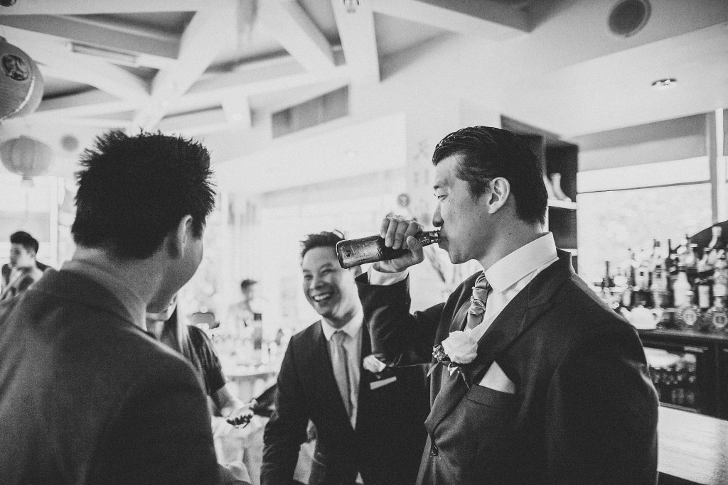 nicholas-lau-photo-photography-wedding-uk-london-asian-chinese-groom-black-white-drinking