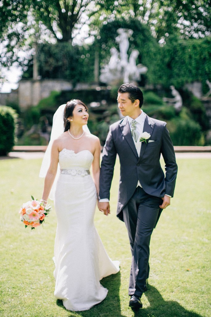 nicholas-lau-photo-photography-wedding-uk-london-asian-chinese-married-couple-bride-groom-walk-together-grey-suit-mermaid-gown-twickenham