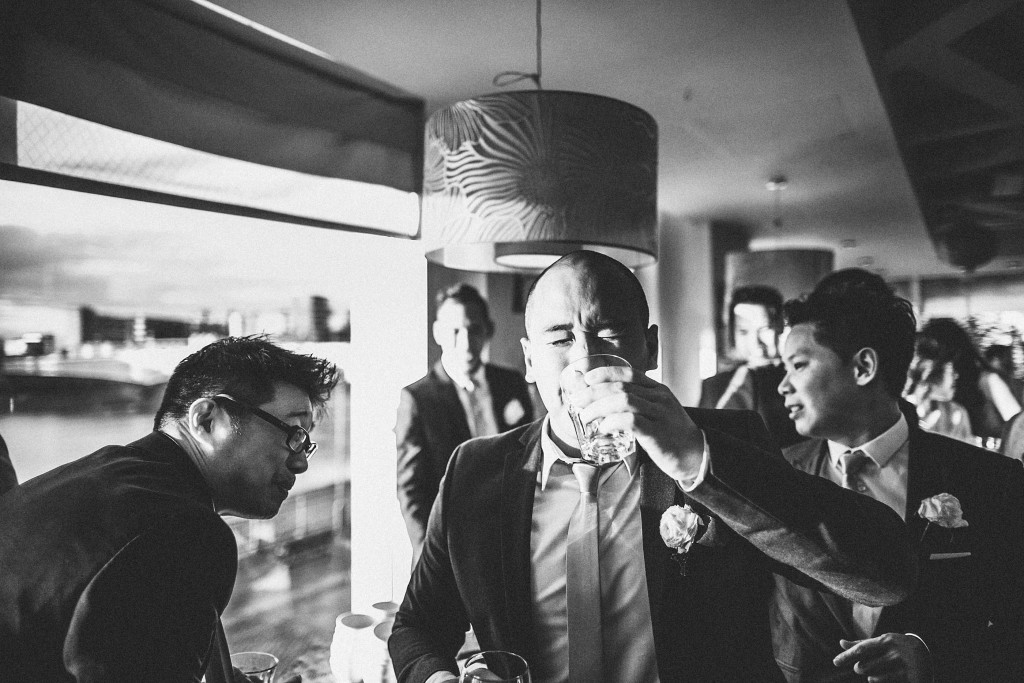 nicholas-lau-photo-photography-wedding-uk-london-asian-chinese-taking-a-shot-reception