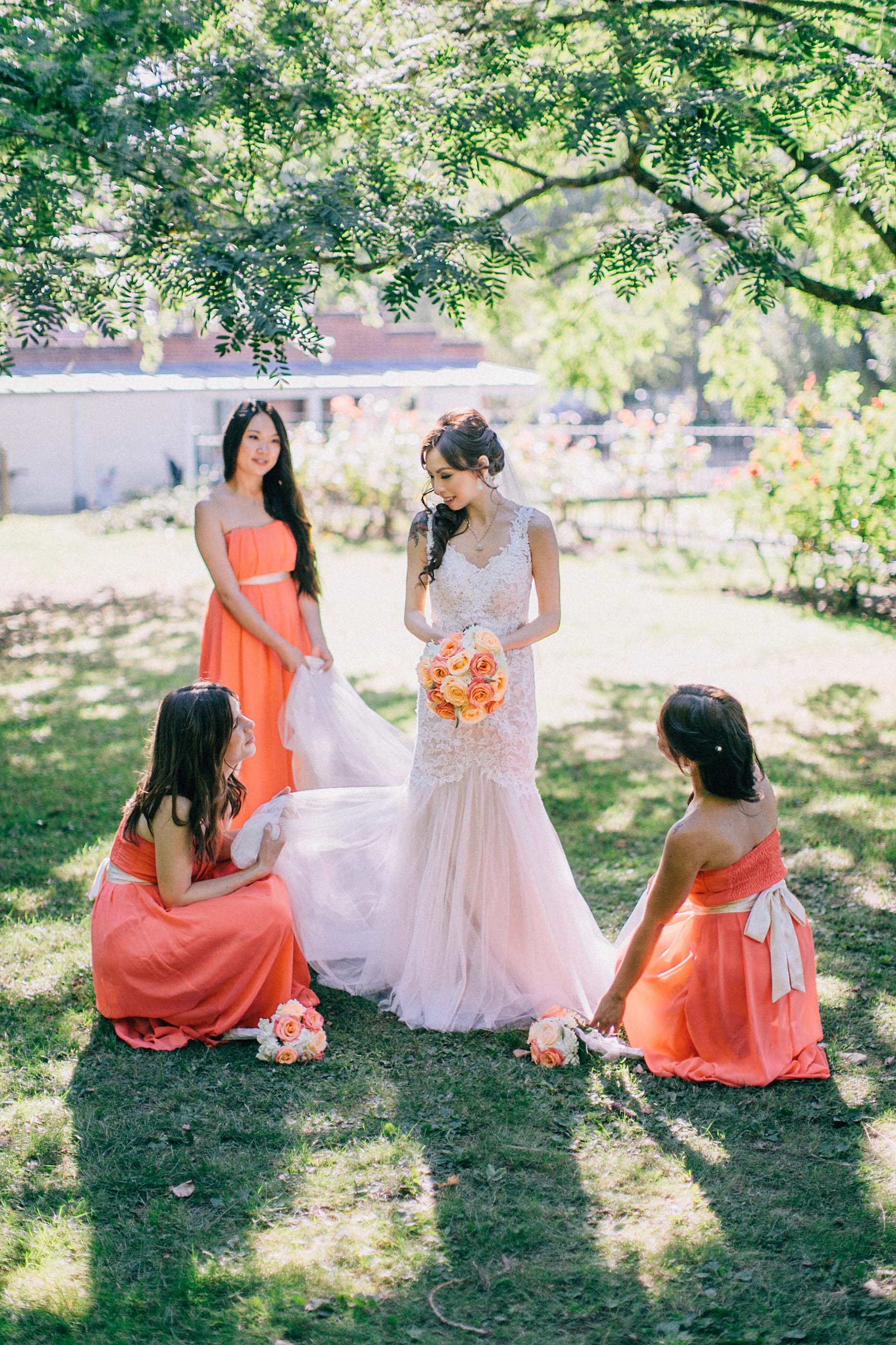 nicholas-lau-photo-photography-fine-art-film-wedding-london-asian-chinese-uk-mulitcultural-ceremony-reception-bridesmaids-spreading-tail-skirt-of-dress