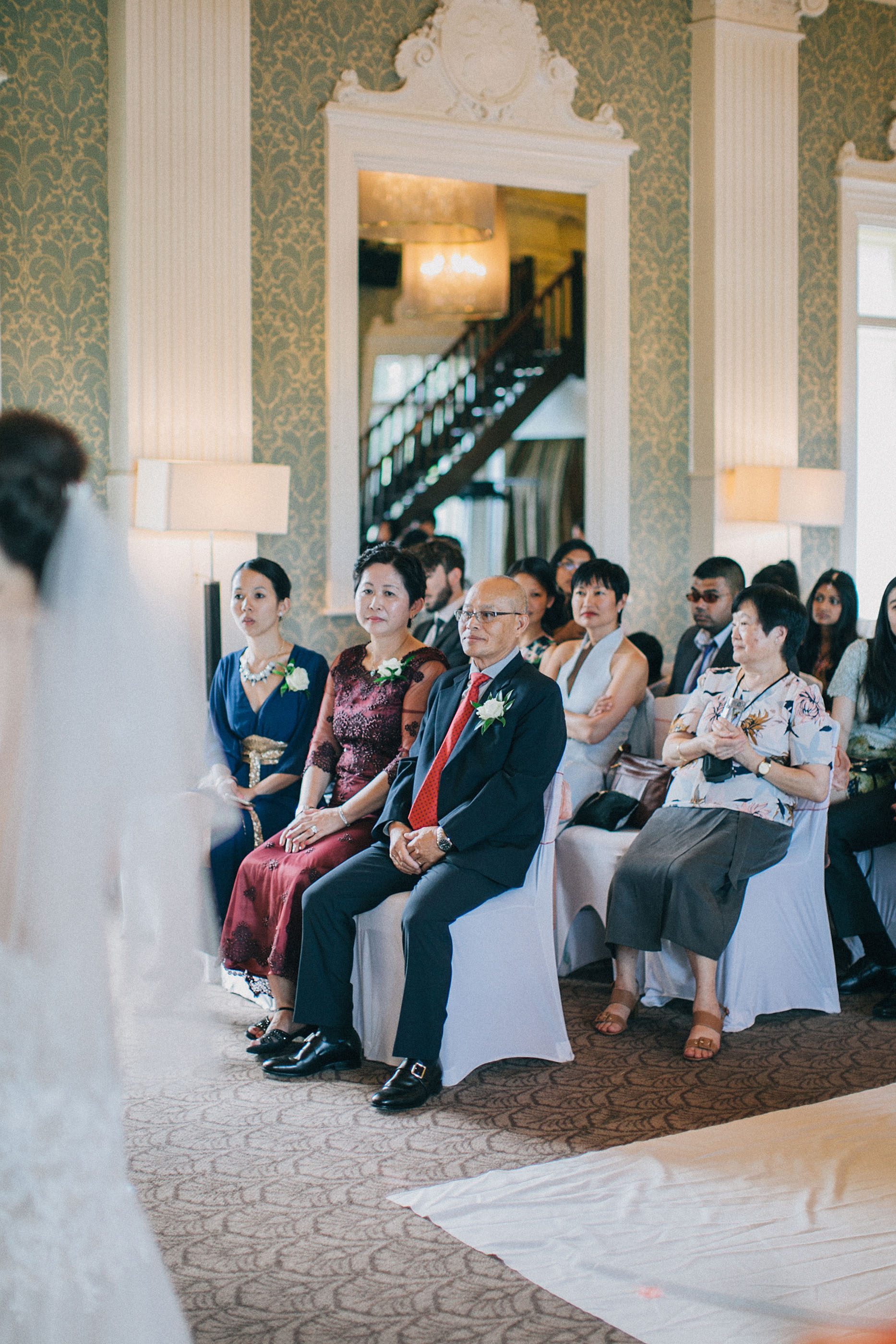 nicholas-lau-photo-photography-fine-art-film-wedding-london-asian-chinese-uk-mulitcultural-ceremony-reception-guests-seated-star-and-garter-venue