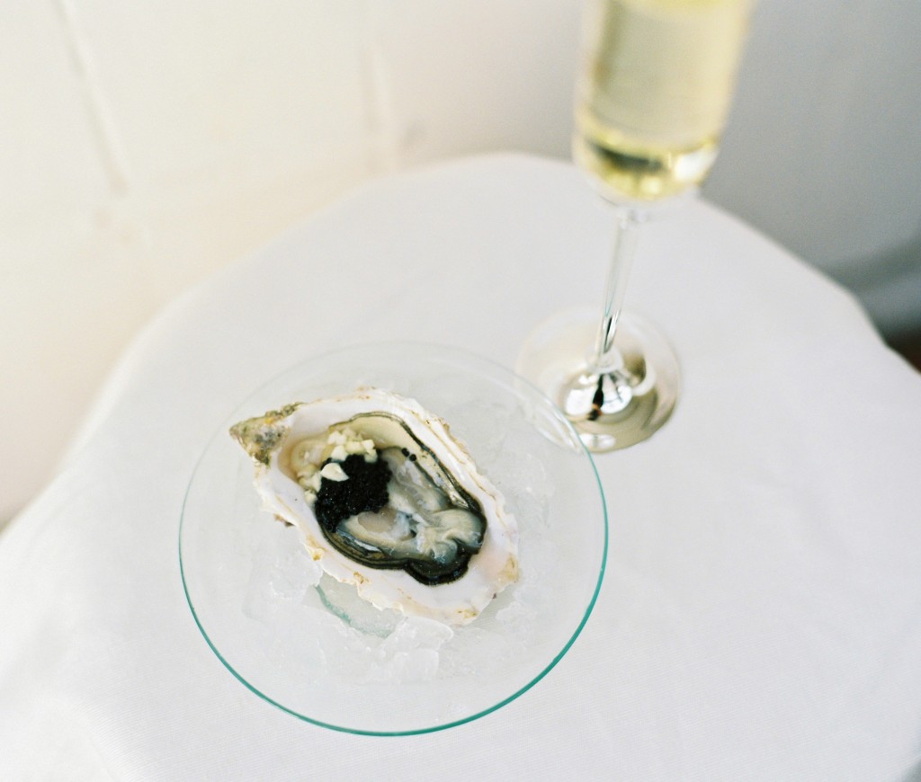 nicholas-lau-photo-photography-oyster-oysters-fruit-de-mer-seafood-lifestyle-film-fuji-contax-645-billingsgate-london-market-maldon-cavier-champagne-flute-glass-on-ice-garlic