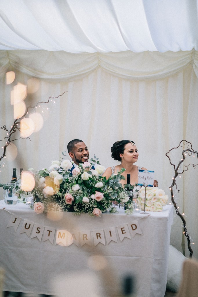 nicholas-lau-wedding-photo-photography-london-uk-ethnic-indian-black-multicultural-beautiful-summer-spring-cherry-blossoms-elegant-gilwell-park-reception-bride-groom-table