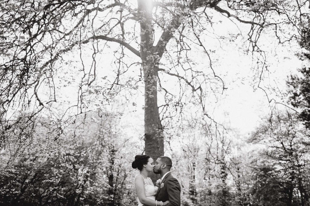 nicholas-lau-wedding-photo-photography-london-uk-ethnic-indian-black-multicultural-beautiful-summer-spring-cherry-blossoms-elegant-gilwell-park-white-trees-kiss