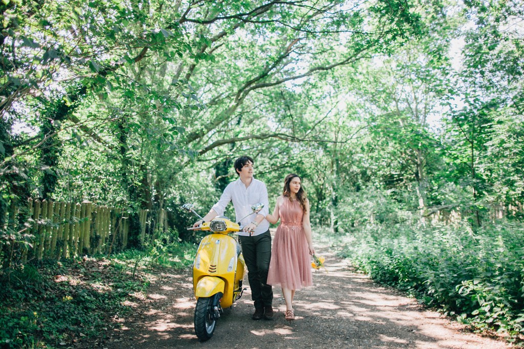 Nicholas-lau-photo-photography-fine-art-wedding-engagement-london-uk-photographer-wanstead-park-summer-love-cute-couple-la-land-garden-vespa-yellow-walking