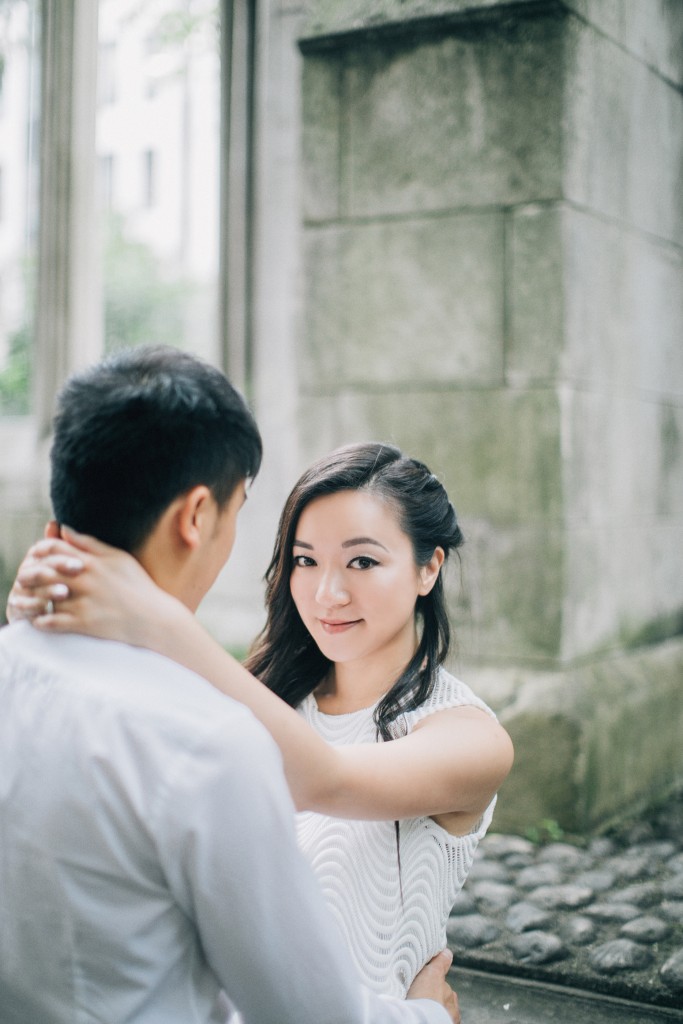 nicholas-lau-photo-photography-St-Dunstan-in-the-East-church-cathedral-london-landmark-engagement-chinese-couple-photoshoot-borough-market-she-looks-stone-wall